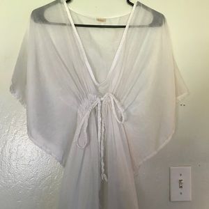 White bathing suit cover up!